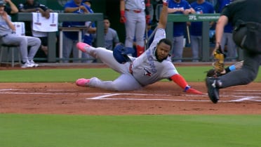 Vladimir Guerrero Jr. scores on throwing error