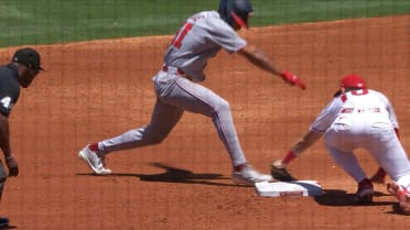 Kevin Newman tags out Daylen Lile after review