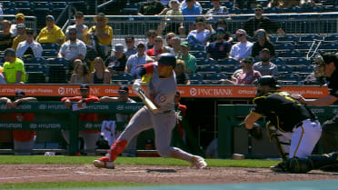 Daylen Lile scores on a wild pitch