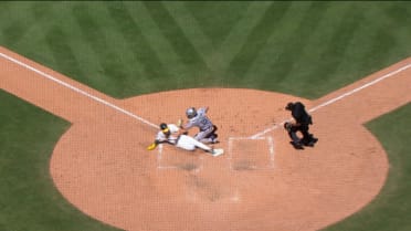 Zack Gelof is out at the plate after a review