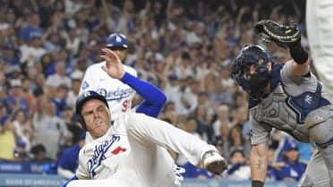 Freddie Freeman is safe at home plate after review