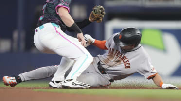 Jung Hoo Lee steals second base after a review