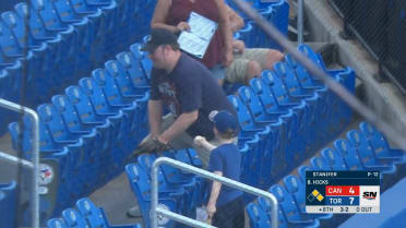 Young Blue Jays fan gives Tigers fan foul ball