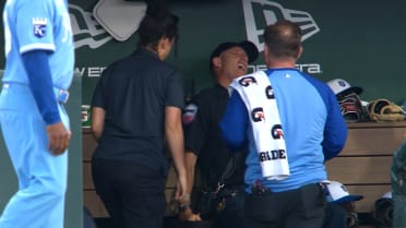 EMT member gets hit with a ball in the dugout