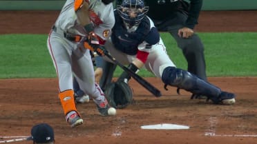 Cedric Mullins is hit by a pitch after review