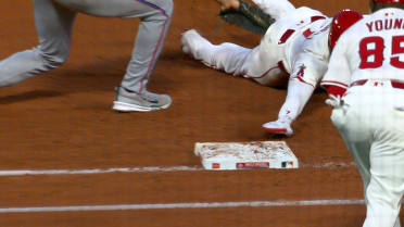 Jo Adell is out at first base after review 