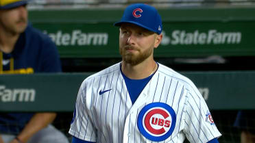 Michael Busch makes a great catch in foul territory 
