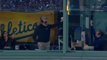 Dallas Braden snags a foul ball from the booth