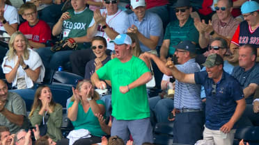 Fan reacts ecstatically after catching foul ball
