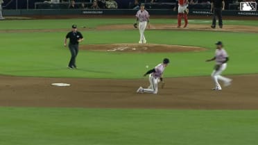 Andy Weber dives and flips the ball behind his back