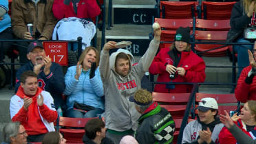 Red Sox fan catches foul ball in his fried dough 