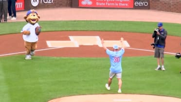 Joey Swoll throws out the first pitch for the Cubs