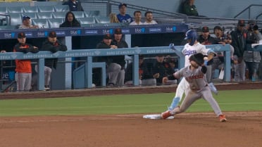 Andy Pages is safe at first base after challenge