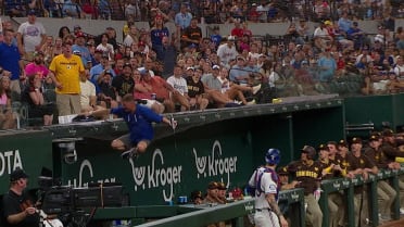 Fan loses beer, stumbles trying to catch a foul ball 
