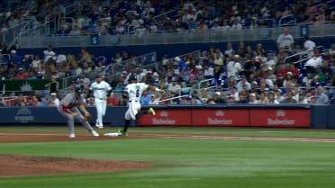 Otto Lopez safe at first after manager's challenge