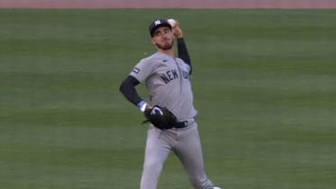 Cody Bellinger throws out Riley Greene at the plate