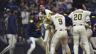 Christian Yelich pega grand slam de oro en extras