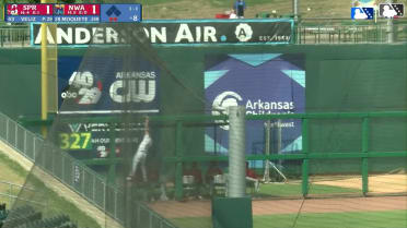 Spencer Nivens climbs the fence for a nice snag 