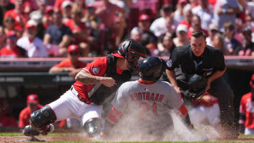 Lars Nootbaar ruled safe at home plate after review