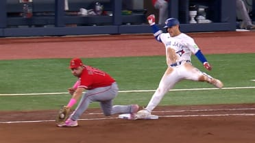 Daulton Varsho ruled safe after replay review