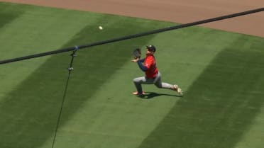 Kyle Tucker makes a sliding catch in right-center