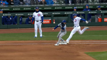 Ian Happ is ruled safe at first after a review