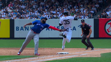 Bo Bichette nabs Cody Bellinger at first after review
