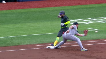 Cedric Mullins ruled safe at first after review