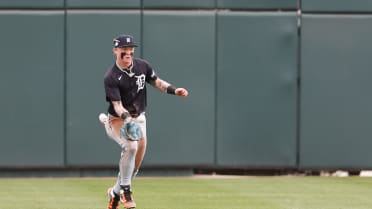 Max Clark throws behind the runner for the out