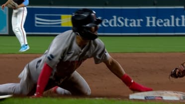 David Hamilton touches third base 