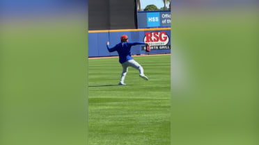 Juan Soto works out in left field