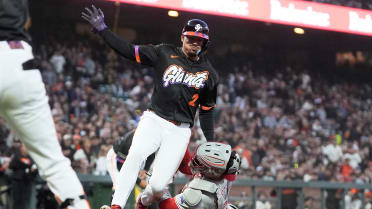 Adolis García nabs Willy Adames at the plate