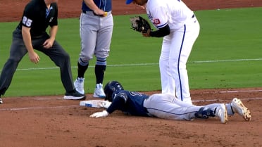 Nick Fortes out at first base after replay review