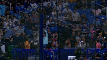 Rays fan loses beverage, gets foul ball!
