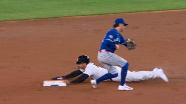 Trent Grisham steals second base
