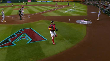Tommy White scores off a wild pitch