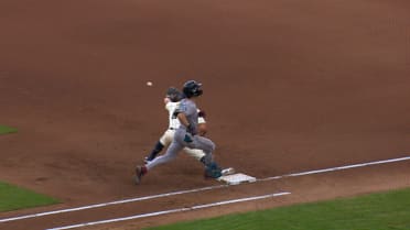 Andruw Monasterio turns a double play after review