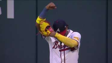 Ronald Acuña Jr. makes a leaping catch at the wall
