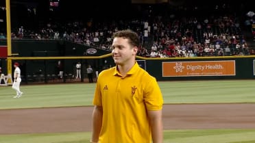Landon Hairston throws out the first pitch