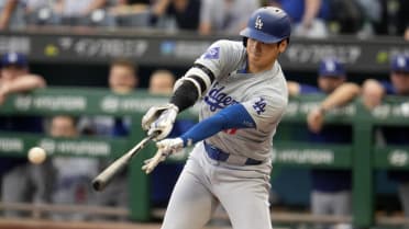 Shohei Ohtani singles after review