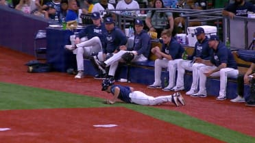 Rays ballboy makes a diving stop