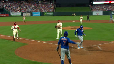 Ian Happ scores on Matt Pushard's wild pitch