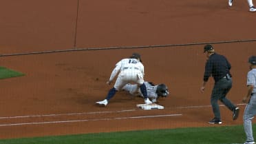 Luisangel Acuña safe at first after review