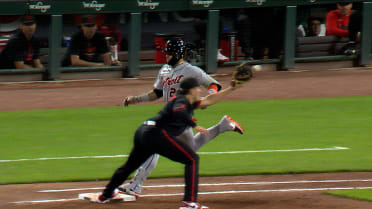 Javier Báez safe at first after a review