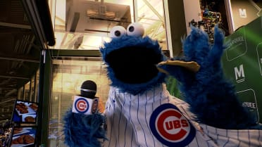 Cookie Monster leads 7th Inning Stretch on Cookie Day