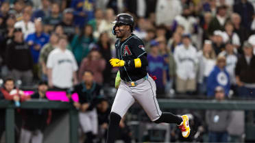 Geraldo Perdomo scores from second on a passed ball