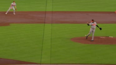 Brandon Young kicks the ball to himself for the out