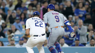 Nimmo safe at first after review, run scores