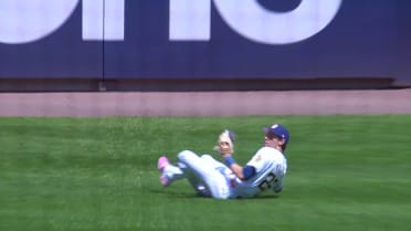 Christian Yelich slides for a nifty catch in left