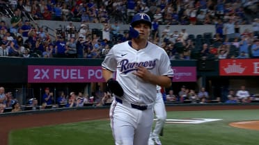 Corey Seager scores on a wild pitch